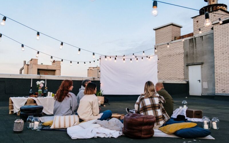 Backyard Movie Nights: Projector vs TV Outdoors