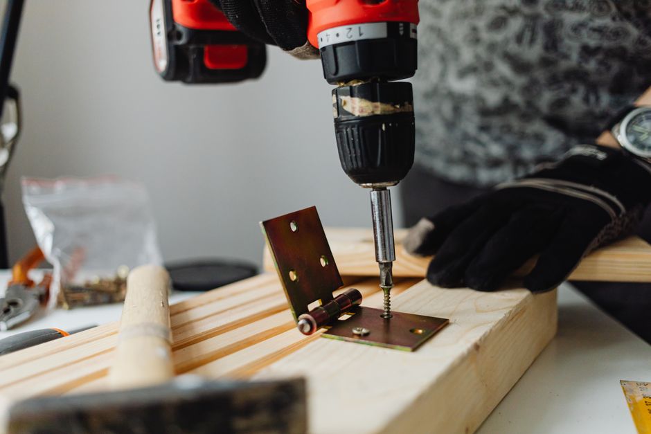 Install hardware and hang the mirror