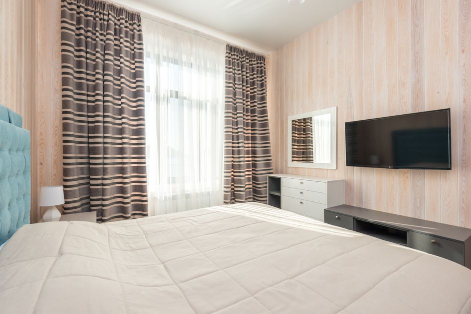 How to Arrange a 300 Square Foot Studio for Sleeping and Working